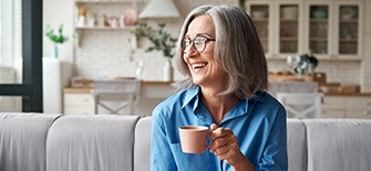 Patient in Indianapolis smiling with dentures